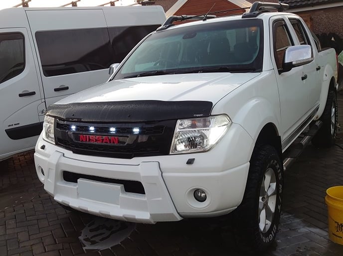 NISSAN FRONTIER 2005-2008 GRILL RED NISSAN