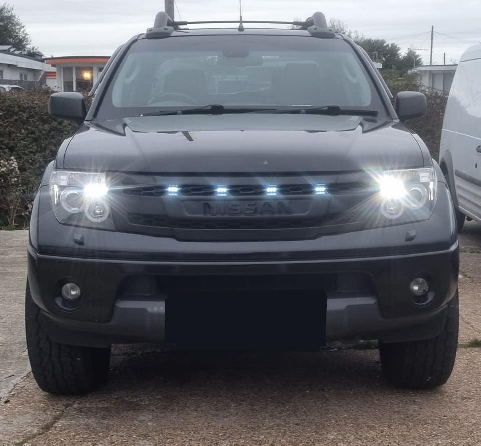 NISSAN FRONTIER 2005-2008 GRILL BLACK NISSAN